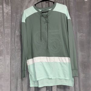 95’ green and white sweatshirt with strings